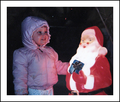 Baby me with a light up Santa Claus